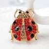 Broche mariquita
