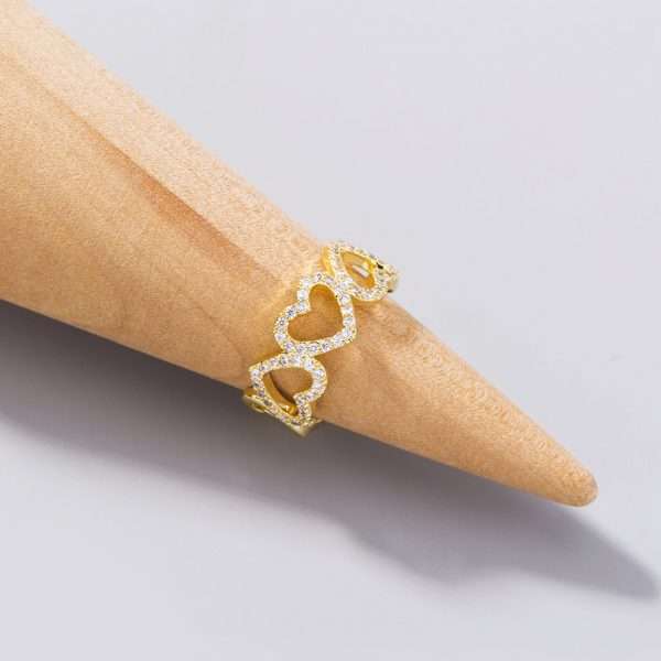 anillo corazones trenzados golden