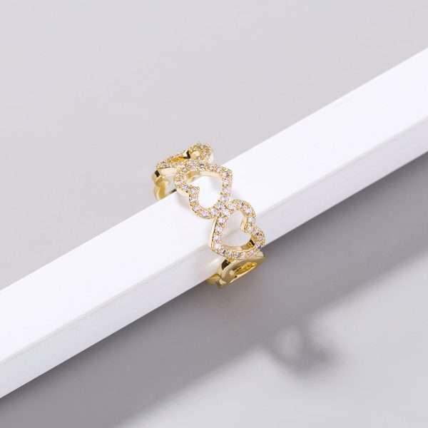 anillo corazones trenzados golden - Imagen 2