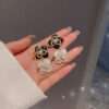 aretes flores ch negras - Imagen 3