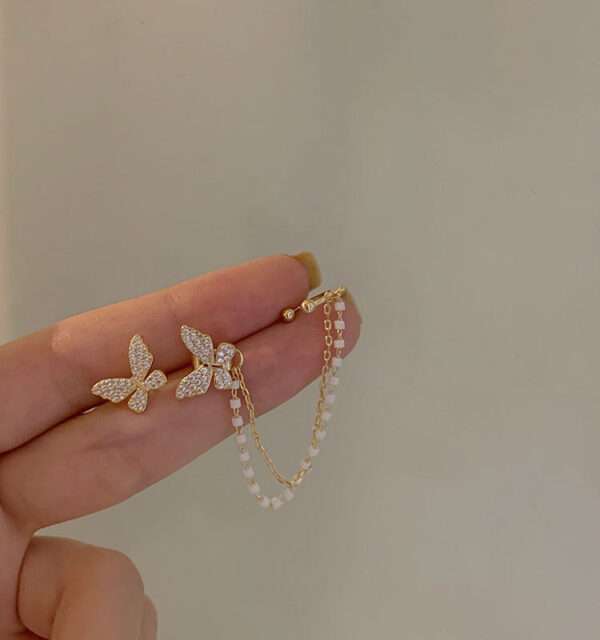 aretes mariposa tassel