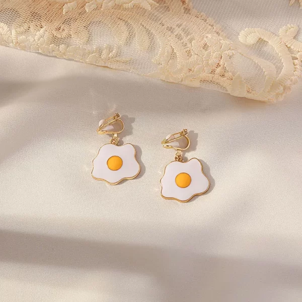 aretes broche de clip fried eggs