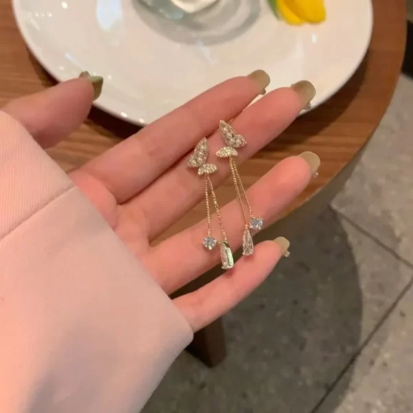 aretes broche de clip mariposa long