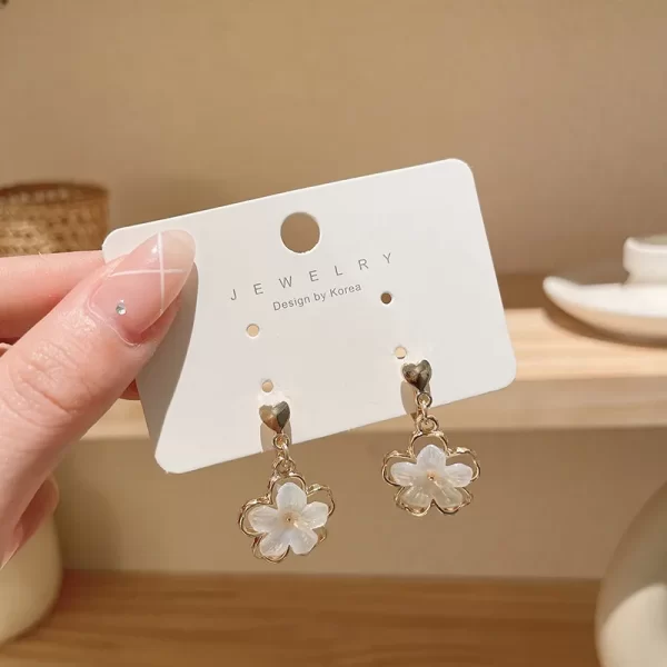 aretes broche de clip flores perla colgantes