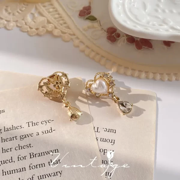 aretes broche de clip perla corazon zircon