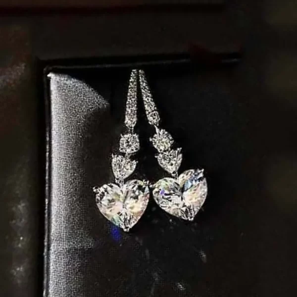 aretes corazon blanco silver plated long