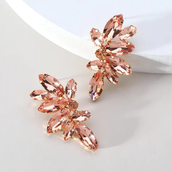 aretes hojas rhinestones rose gold