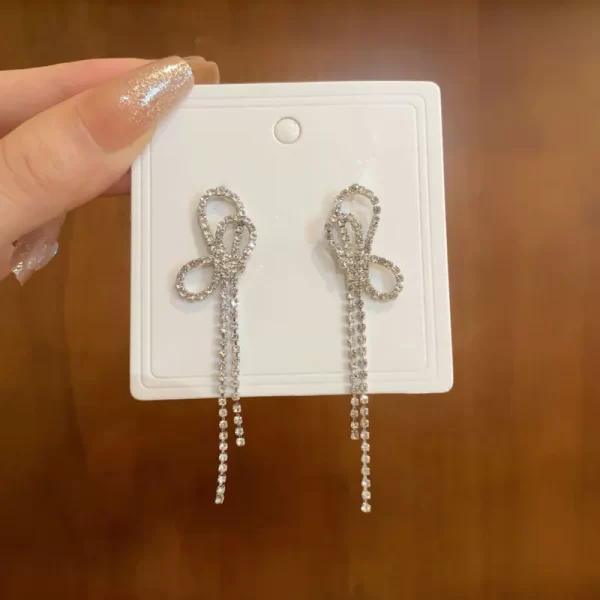 aretes bow silver rhinestones lazito