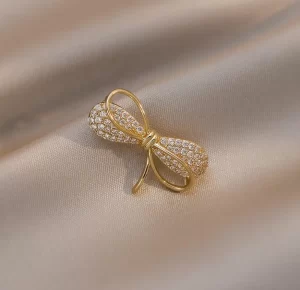 broche bow zircon