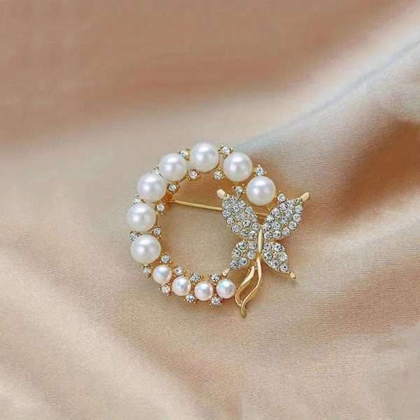broche coronita perlas
