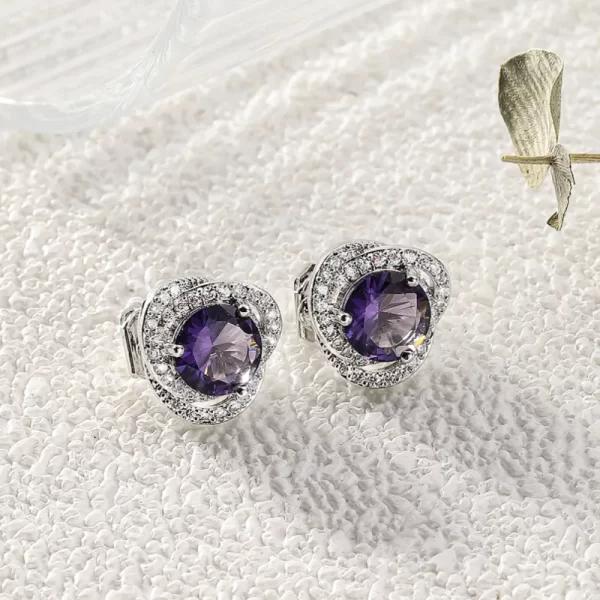 aretes broche de clip zircon purpple