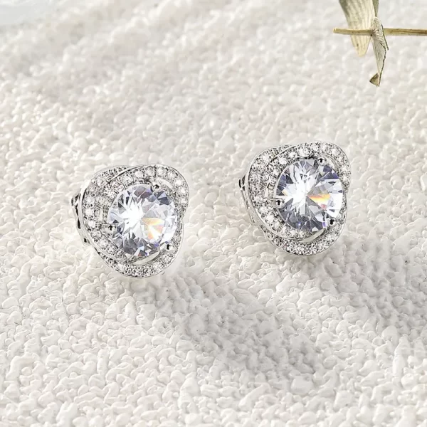 aretes broche de clip zircon blancos