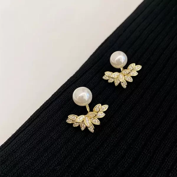 aretes perlas wings