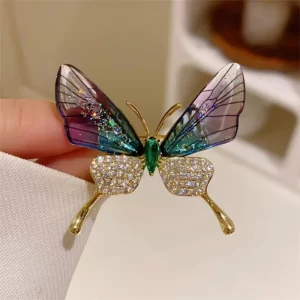 Broche mariposa lila zircon
