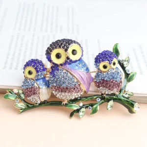 broche buhos family