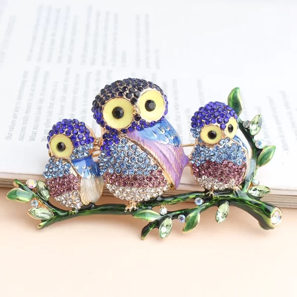 broche buhos family