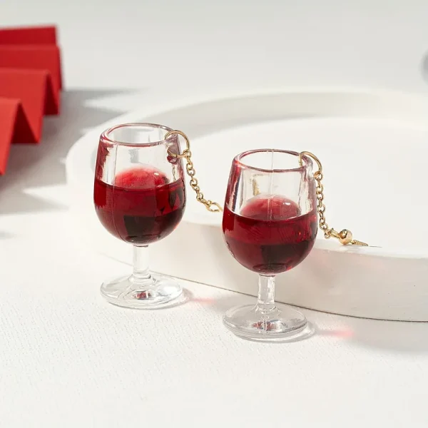 aretes copita de vino tinto