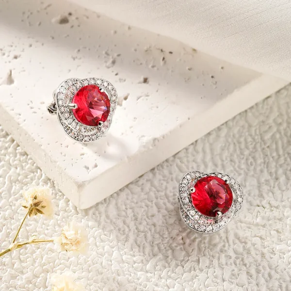 aretes broche de clip zircon rojo