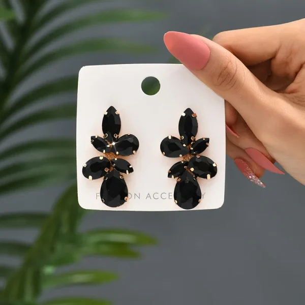 aretes hojas rhinestones medium negros