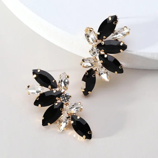 aretes hojas rhinestones blanco con negro
