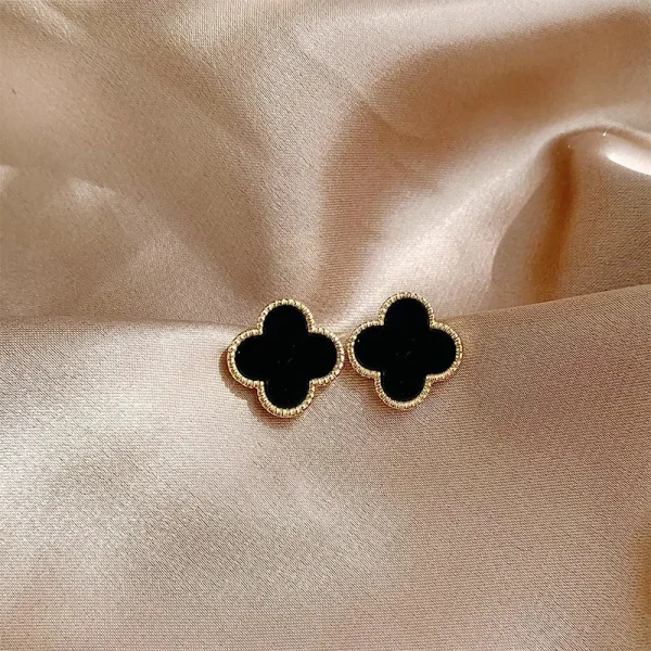 aretes broche de clipestilo Van Cleef trebol negro