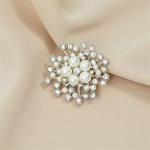 Broche perla zircon