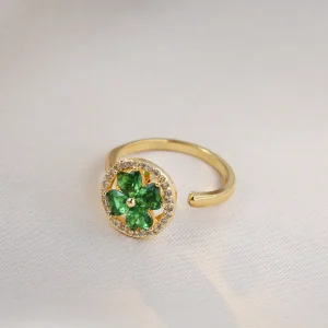 anillo trebol rotable